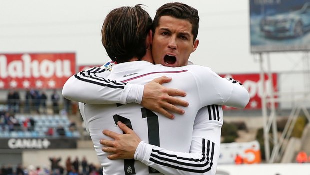 Real Madrid superstars Cristiano Ronaldo and Gareth Bale share a moment during their side's 3-0 win at Getafe in La Liga. 