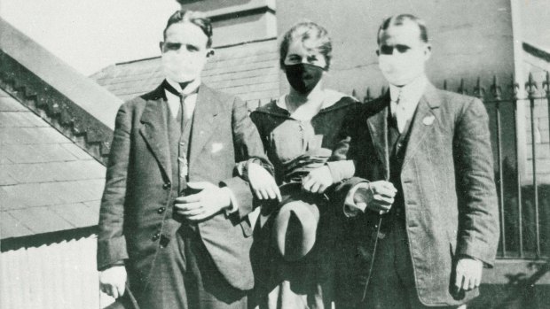 People wearing face masks during influenza epidemic in Sydney, 1919.