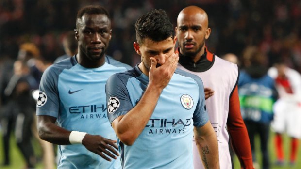 Stunning loss: Man City's Sergio Aguero leaves the pitch.