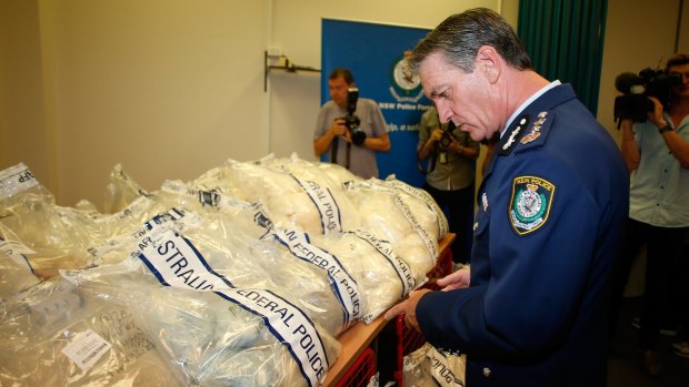 NSW Police Commissioner Andrew Scipione inspects part of the $1.5 billion drug haul that arrived from Hamburg, Germany, in furniture.