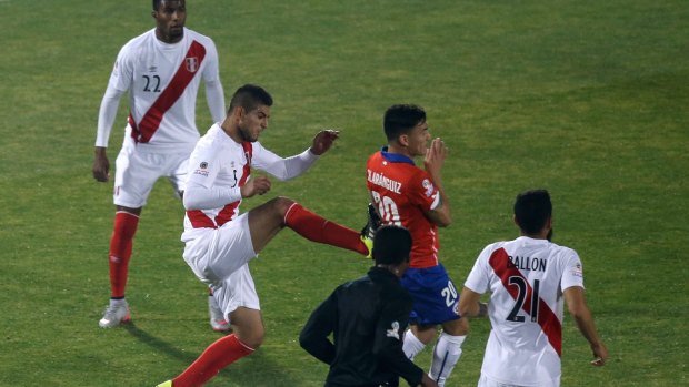 Peru's Carlos Zambrano was sent off over this incident.