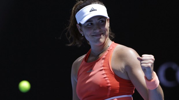 Garbine Muguruza celebrates.