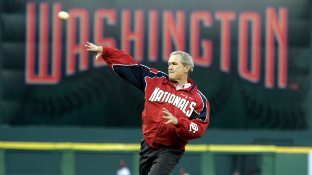 President George Bush throws out the ceremonial first pitch in 2005.