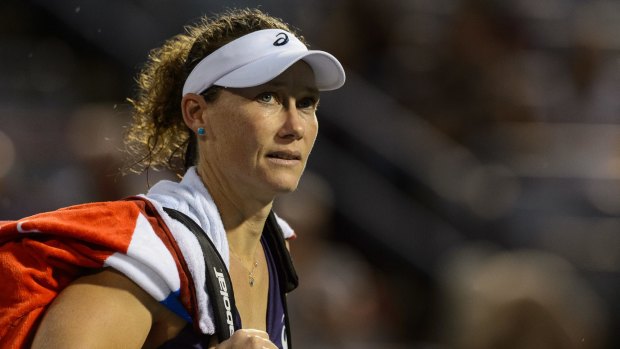 Sam Stosur has been knocked out in the second round of the Rogers Cup.