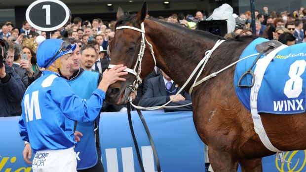 Third-best galloper on the planet: Winx and jockey Hugh Bowman after winning Cox Plate at Moonee Valley in October 2016.