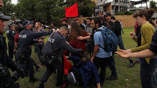 Supporters of Milo Yiannopoulos clash with left-wing protesters.