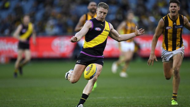 Teeing off: Richmond coach Damien Harwick said Josh Caddy's performance against the Hawks was his best for the club.