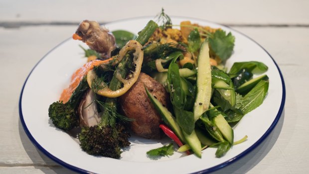 Wood roasted chicken with broccolini and romesco.