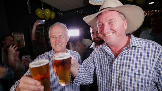 Prime Minister Malcolm Turnbull celebrates with the newly re-elected Barnaby Joyce in Tamworth.