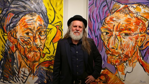 Artist George Gittoes at his 2014 exhibition, Vincent and the Snow Monkey, at Sydney’s Art 
Equity gallery.