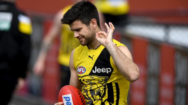 Trent Cotchin says his Tigers will find their own way to deal with the expectation that comes with being reigning premiers.
