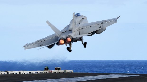 An F/A-18F Super Hornet takes off from the USS Ronald Reagan in the Coral Sea off during the Talisman Sabre military exercise in July.