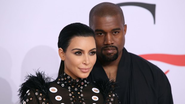 Kim Kardashian and Kanye West in New York. Kardashian is to address the topic of objectification of women in the media at a civic forum on June 30.