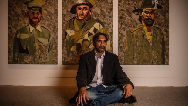 Vincent Namatjira, at Hazelhurst Arts Centre with part of his new work for the exhibition.