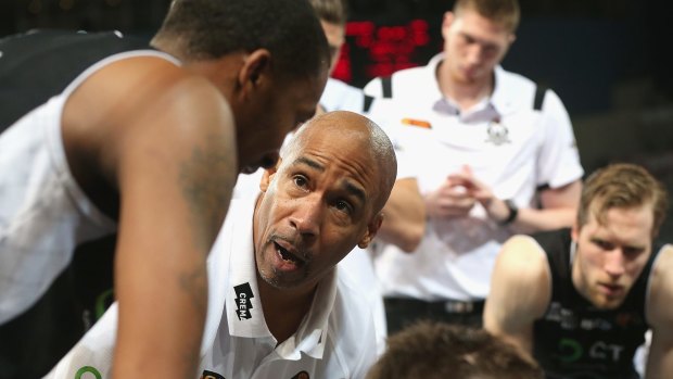 Darryl McDonald talks to his players during the match against the Breakers on Sunday.