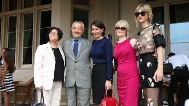 Glady Berejiklian with her parents and sisters after being sworn in as the first female Treasurer in NSW.