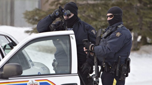 Police search for the gunman in St Albert, Alberta.