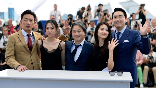 Actor Ha Jung-Woo, actress Kim Min-Hee, director Park Chan-Wook, actress Kim Tae-Ri and actor Cho Jin-Woong attend 'The Handmaiden' photocall during the Cannes Film Festival.