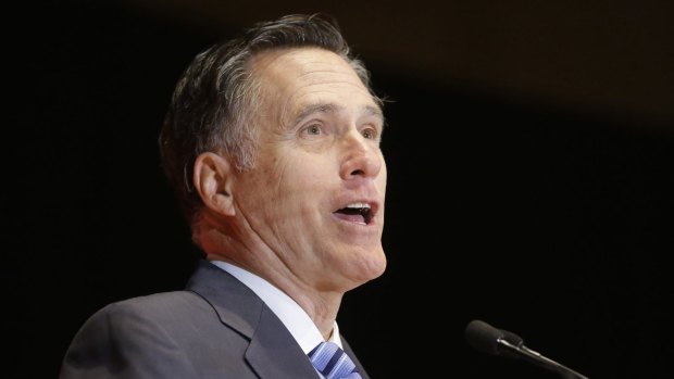 2012 Republican presidential candidate Mitt Romney attacks Donald Trump in a speech in March. 