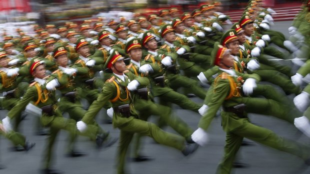 Military personnel take part in a parade celebrating the 40th anniversary of the end of the Vietnam War in Ho Chi Minh City last year. 