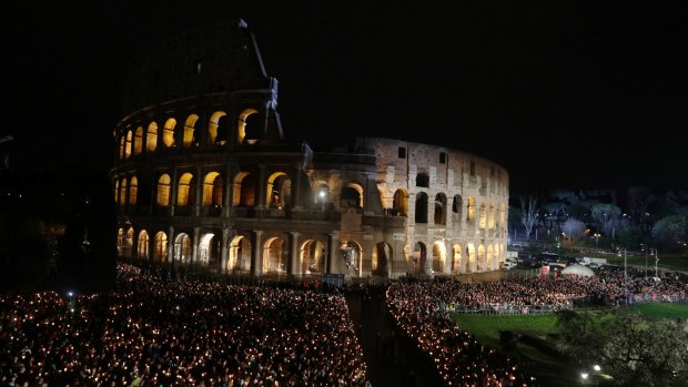 The Way of the Cross took commemorates the crucifixion of Jesus Christ and his death at Calvary, takes place in front of Rome's Colosseum.