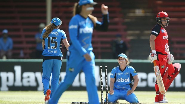 Bridget Patterson of the Adelaide Strikers smiles after diving for an attempted runout during the Women's Big Bash League. 