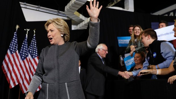 Hillary Clinton and Senator Bernie Sanders arrive for a panel discussion at the University Of New Hampshire. 