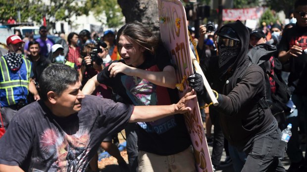 Protesters clash during a free speech rally at Berkeley in August.