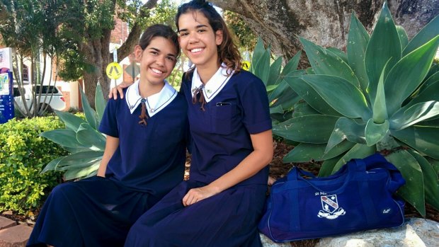 Identical twins Jadalyn and Jazleen De Busch will study at St Margaret's Anglican Girls School in Ascot this year along with seven other sets of twins.