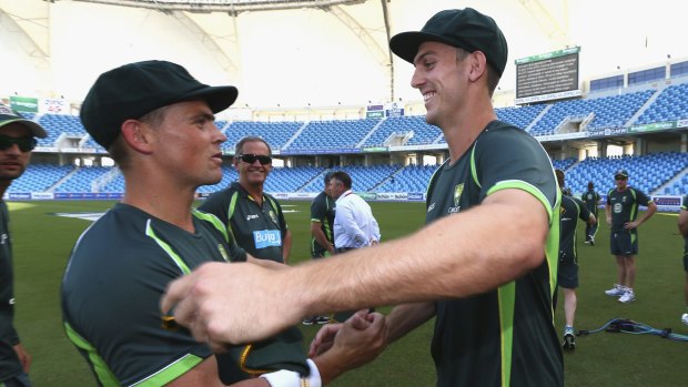 Rookies: Steve O'Keefe and Mitch Marsh of Australia congratulate each other after receiving their Baggy Green caps.