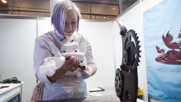 Bec Backhouse, owner of It's a Sweet Life in Belconnen, creates a chocolate sculpture. 