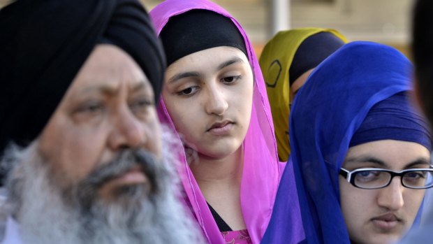 Members of the Sikh community gather for a news conference at the Sikh Association of Fresno Temple in California in 2012, in response to the shooting in Wisconsin at a Sikh temple when six people were killed by an unidentified gunman. 