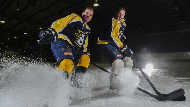 Jayden, left, and Dave Lewis of the Canberra Brave are the first father-son combination to play together in the Australian Ice Hockey League.