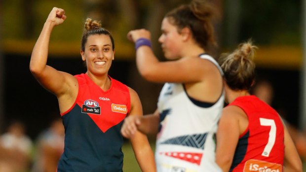 Demon Alyssa Mifsud celebrates a goal against the Crows on a humid night in Darwin.