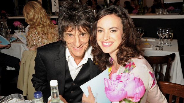 Ronnie Wood (L) and Sally Wood attend The Masterpiece Midsummer Party in aid of Marie Curie Cancer Care, hosted by Heather Kerzner, at The Royal Hospital Chelsea on July 2, 2013 in London, England. 