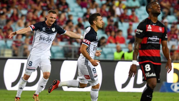 Finding the back of the net: Besart Berisha congratulates Kosta Barbarouses on yet another goal.