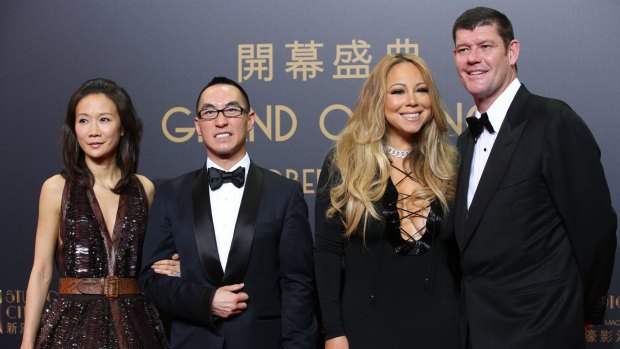 Hopeful: Melco's Lawrence Ho (second left) with his wife, Sharen Lo, and James Packer and his girlfriend, Mariah Carey, at the opening ceremony for the Studio City casino on Tuesday.