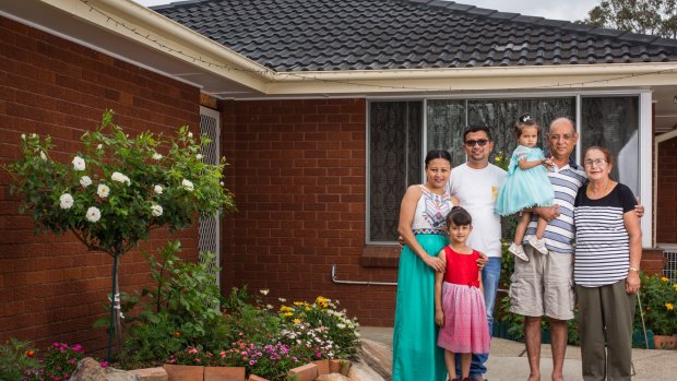 Three generations of the Chhetri family in their home in Marayong in Sydney, with the five adults paying the mortgage.  From left are Goma Khadka Chhetri, Sharon Chhetri (older daughter), Suman Chhetri, Shayana Chhetri (younger daughter), Nakul Chhetri and Dibyasori Chhetri.