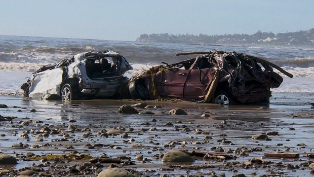 Mangled cars were swept all the way to the coast.