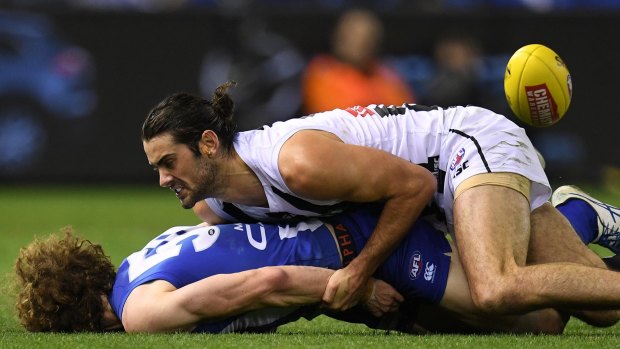 Magpie Brodie Grundy's controversial tackle on North Melbourne's Ben Brown during their round 20 clash on Saturday night.