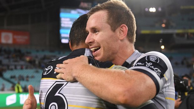 Fairytale beckons: Michael Morgan and Te Maire Martin celebrate after the Cowboys' win.