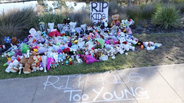 Tributes left for the three children at the scene of the crash.