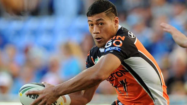 Charges: Former Tiger Tim Simona was arrested by police in Macquarie Fields on Wednesday.