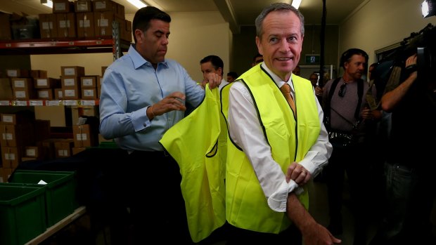 Opposition Leader Bill Shorten on the campaign at a solar wholesale distributor in Brisbane. 