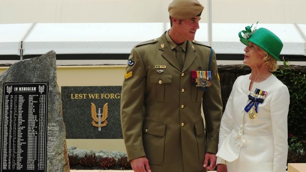 Governor-General Quentin Bryce talks with Corporal Ben Roberts-Smith after awarding him the Victoria Cross in January 2011.