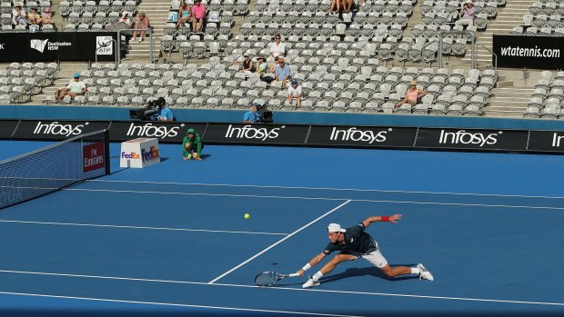 Plenty of good seats available:  James Duckworth plays a backhand in his match against Inigo Cervantes  during day three of the  Sydney International.