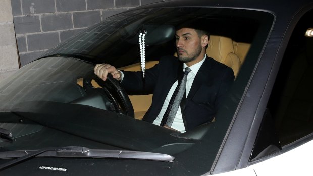 Auburn deputy mayor Salim Mehajer leaves council chambers on Thursday.