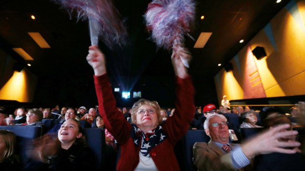 Republican supporters of President Donald Trump watch him deliver his State of The Union speech.