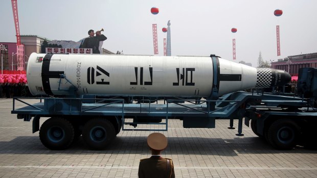A submarine missile is paraded across the Kim Il-sung Square during a military parade, in Pyongyang, North Korea.
