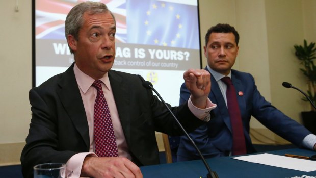 Nigel Farage, left, announced that Mr Woolfe, right, pictured in June, was taken to hospital in a serious condition.